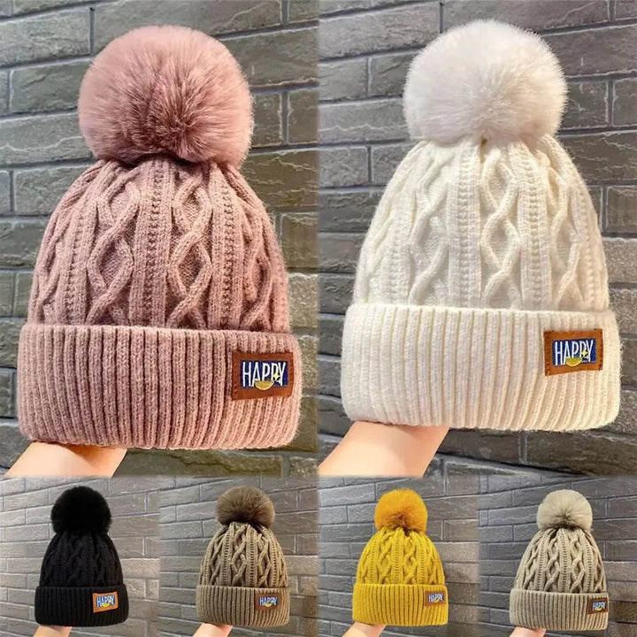 Gorro con pompones chic