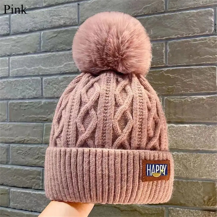 Gorro con pompones chic