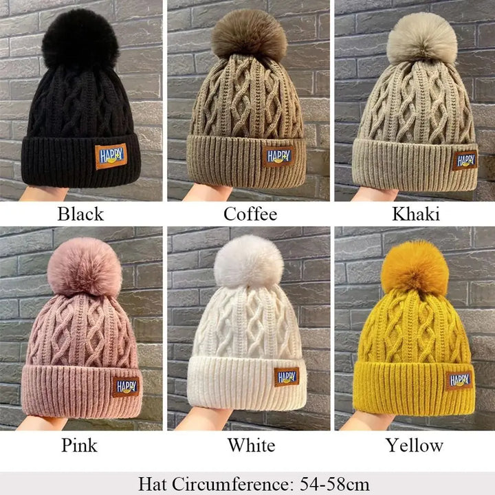 Gorro con pompones chic